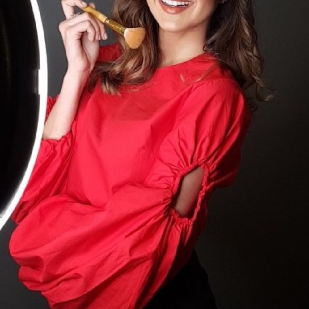 Beautiful red top with details on sleeves